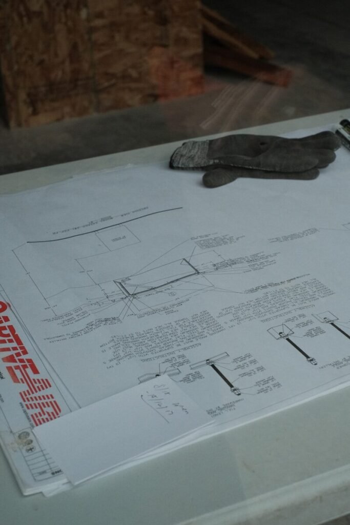 Seal lying on technical drawings
